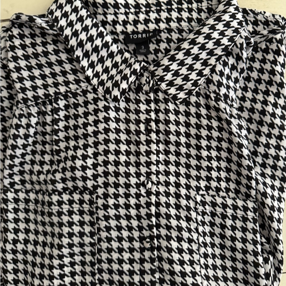 Torrid -two blouses. One houndstooth, the other black striped. Torrid size 3.